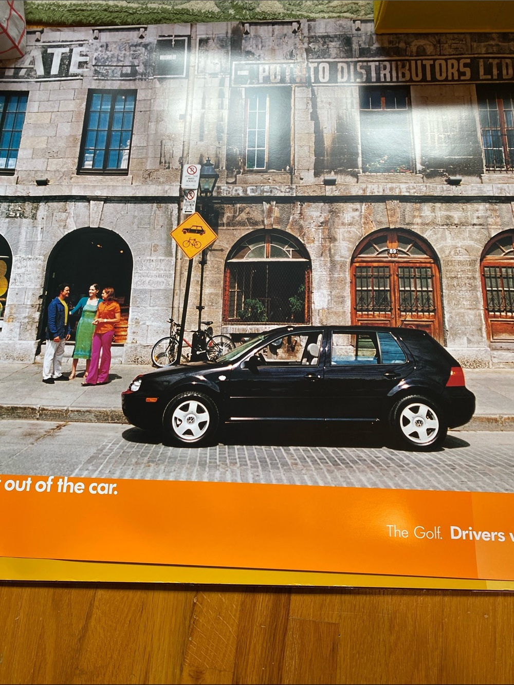 Vintage 2002 Volkswagen Golf promotional poster. Drivers Wanted.